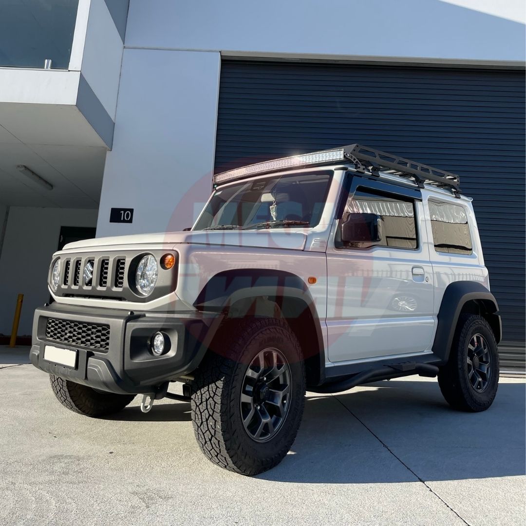 White jimny with megajimny adventure kit