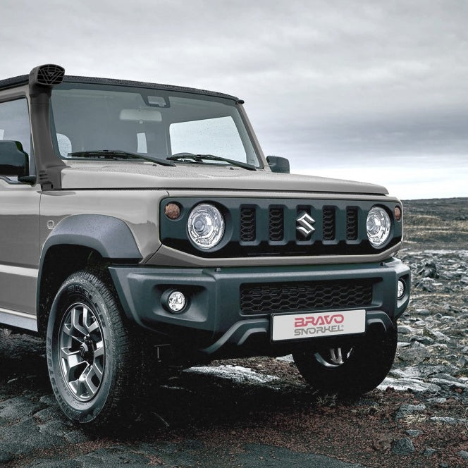Bravo Snorkel Jimny on rocks.