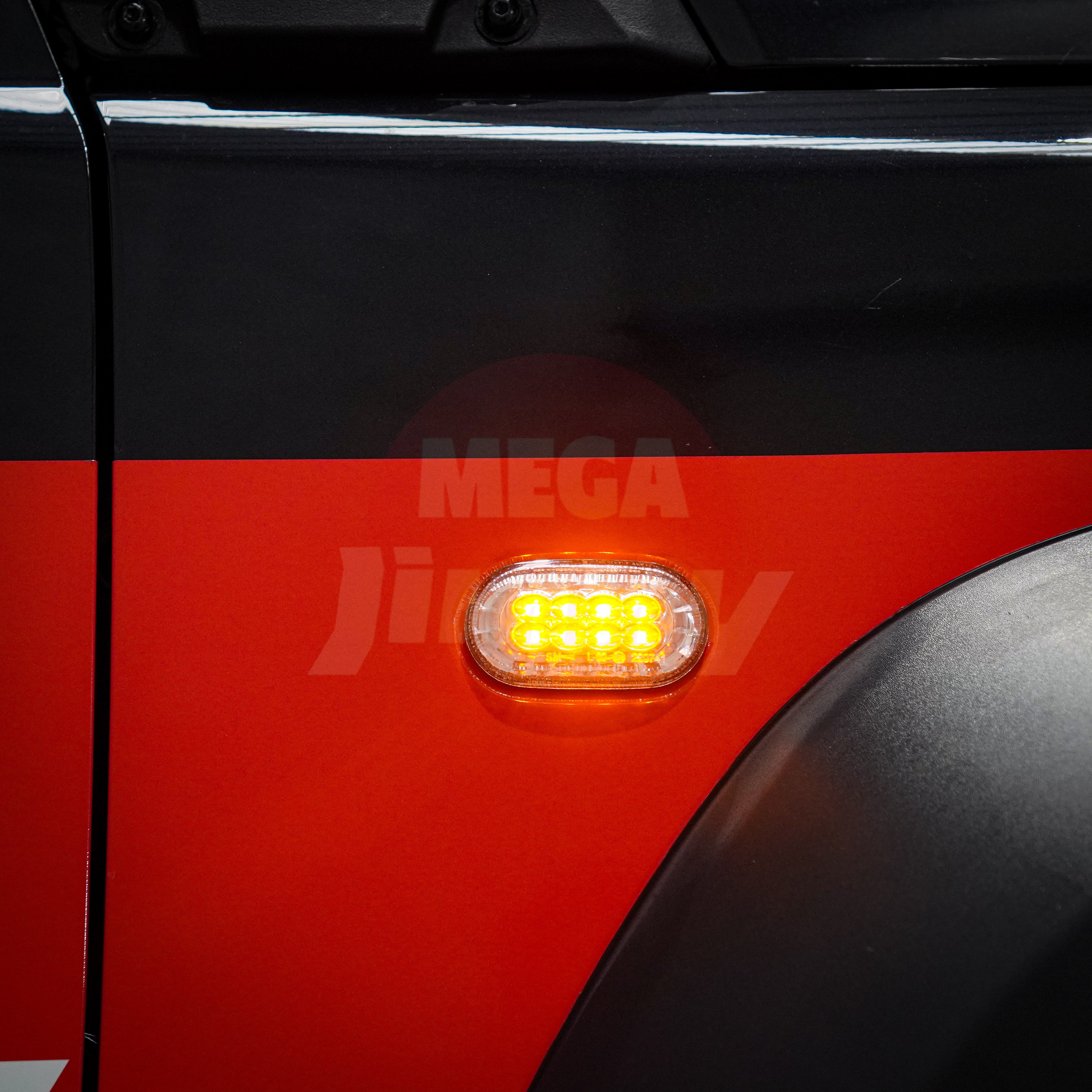 Car side marker light on a red vehicle with 'Mega Jimny' branding.